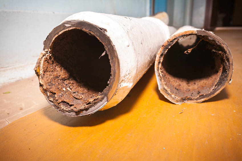 scale buildup in cast iron pipes